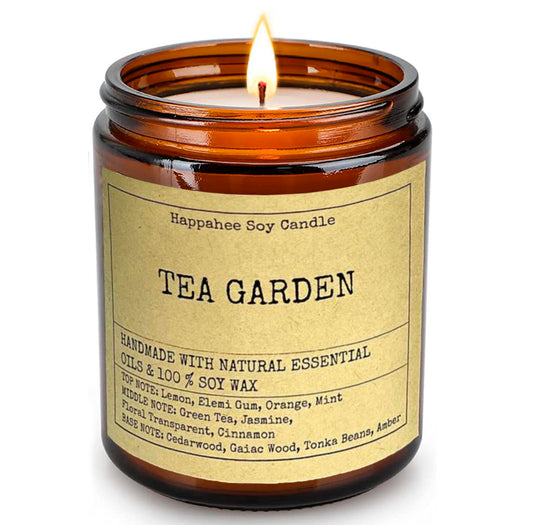 Eco-scented soy candle in amber glass jar with Tea Garden fragrance.